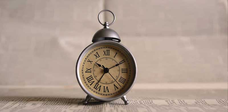 An old fashioned alarm clock.